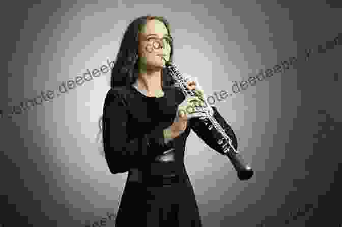 An Oboe Player Performing A Classical Solo. Classical Solos Famous Themes For Oboe