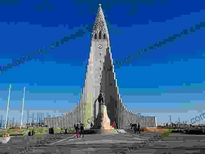 Photograph Of Iceland's Hallgrímskirkja Church In Reykjavík, Showcasing Its Towering Spire And Unique Architectural Design Digging For Roots: Travels In Iceland