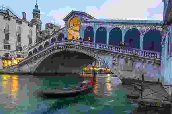 Rialto Bridge In Venice, A Magnificent Arched Stone Structure Crossing The Grand Canal Venice: Basilicas Bell Towers Bridges And Backstreets